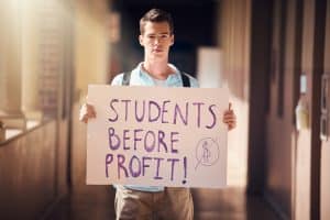 Trump administration cuts Harvard federal funding: protest student