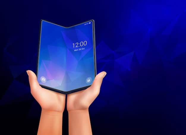 A person holding a foldable smartphone, partially folded, showcasing its innovative display technology. The background shows a modern, minimalist workspace setup with multiple smart devices and a clean aesthetic.
