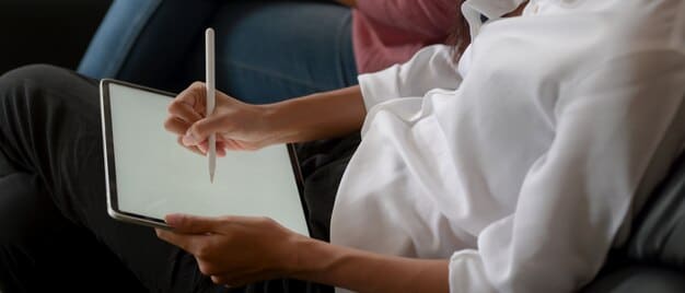 A professional user interacting with the WriteRight Pen on a tablet, demonstrating real-time transcription of handwritten notes into digital text, clean and modern office setting.