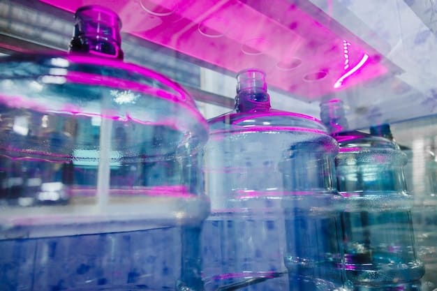 A futuristic bioreactor facility with glowing microbial cultures inside transparent tanks, illustrating advanced biomanufacturing processes.